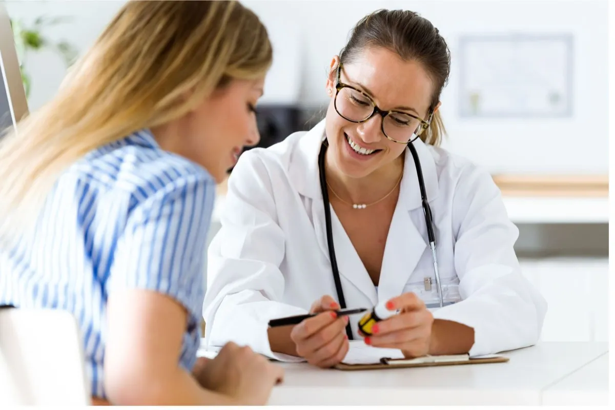 Doctor consulting with patient